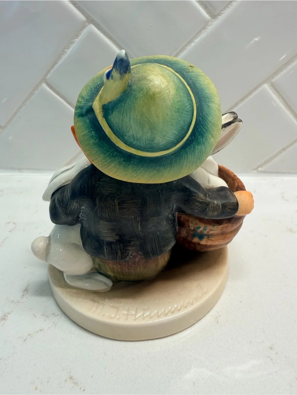 Hummel Style Boy with Bunnies Porcelain Figurine in Pastel Green and Brown
